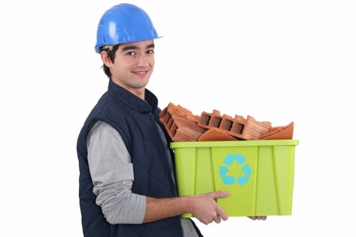 Professional movers packing items for a move
