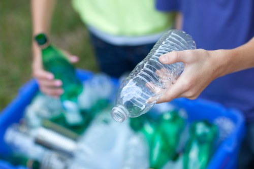 Technicians disposing of electronic equipment responsibly